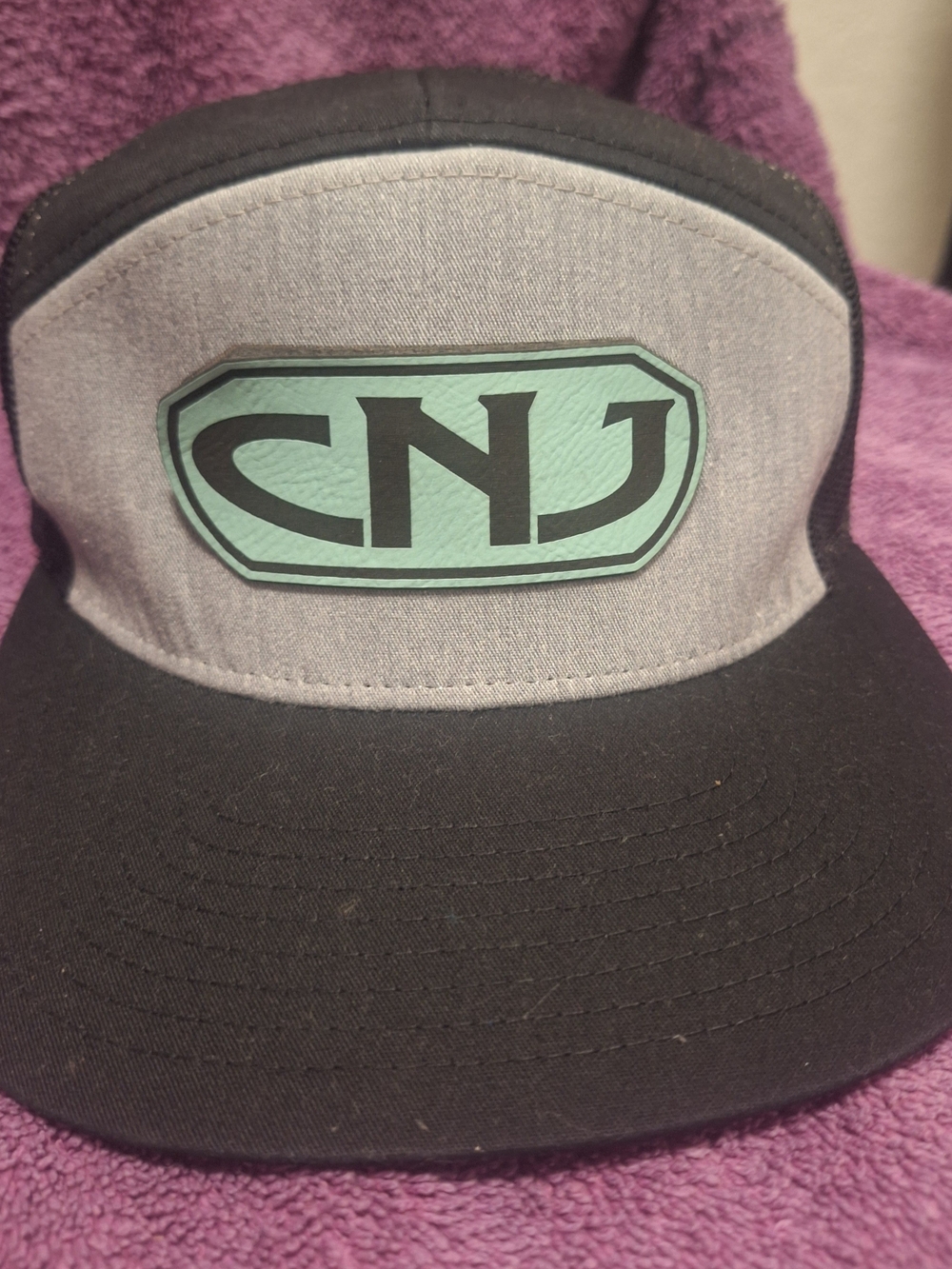 CNJ Two-Tone Black & Gray Trucker Cap with Mint Logo